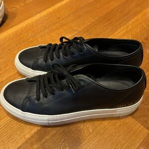 Woman Common Projects platform black sneakers